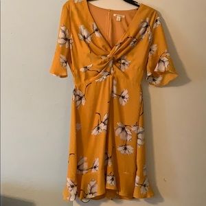 Francesca’s yellow and floral dress